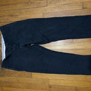 Slightly faded black jeans